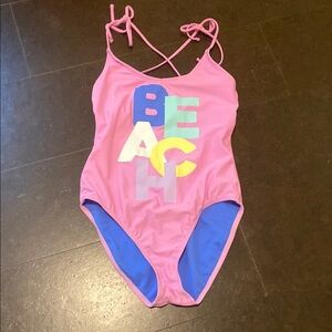 Pink One-Piece Swimsuit with Colorful 'BEACH' Print